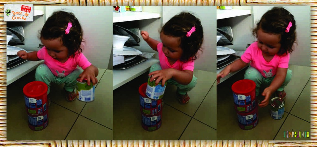 menina empilhando latas