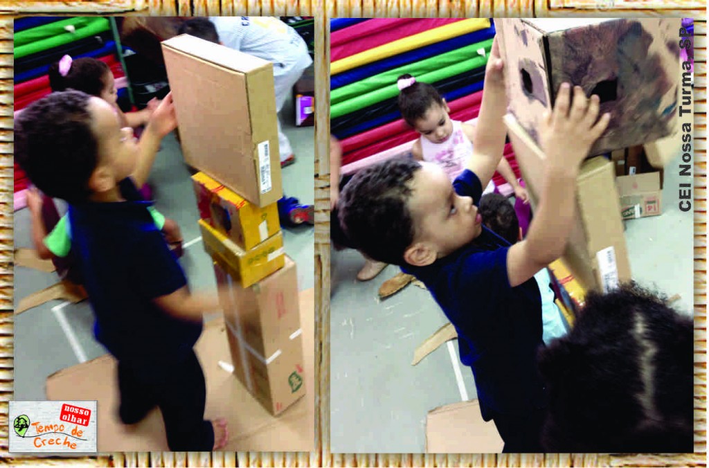 menino empilhando caixas